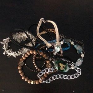 A bunch of bracelets and a necklace